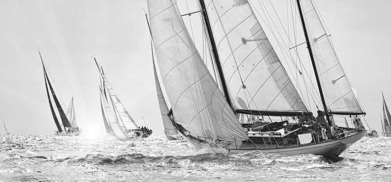Classic sailing yachts racing in open water